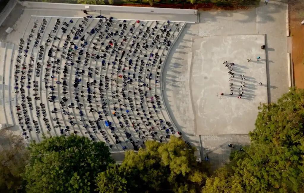 Aerial view of a gathering at Suchitra's open-air amphitheatre